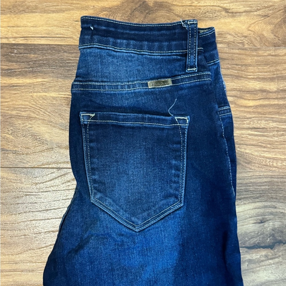 Kancan women’s size 25 jeans are flared at the bottom